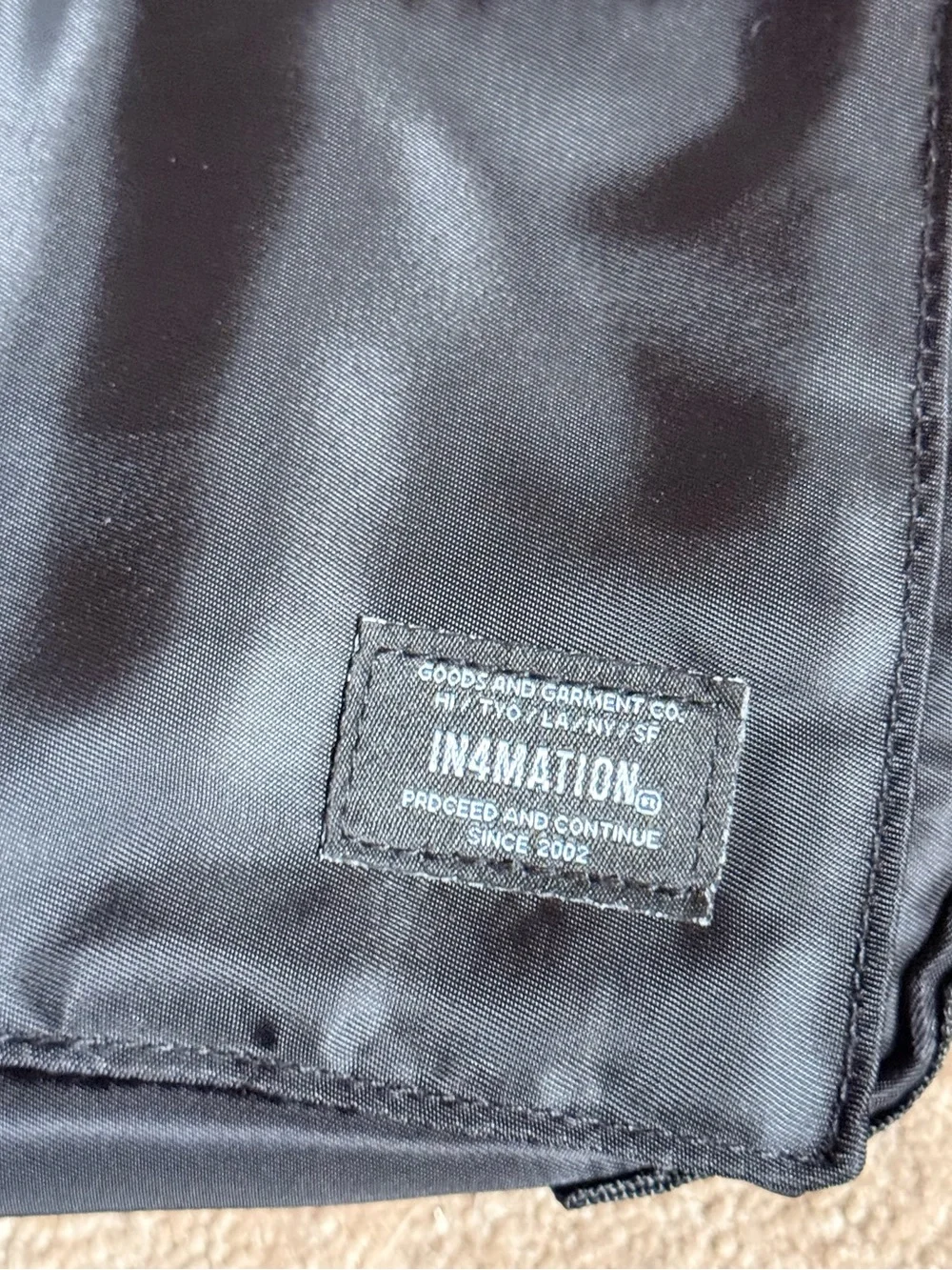 In4mation Black Sling Bag